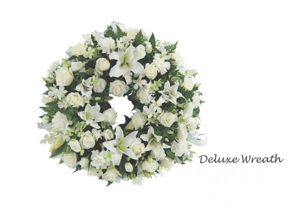deluxe warmth funeral flowers